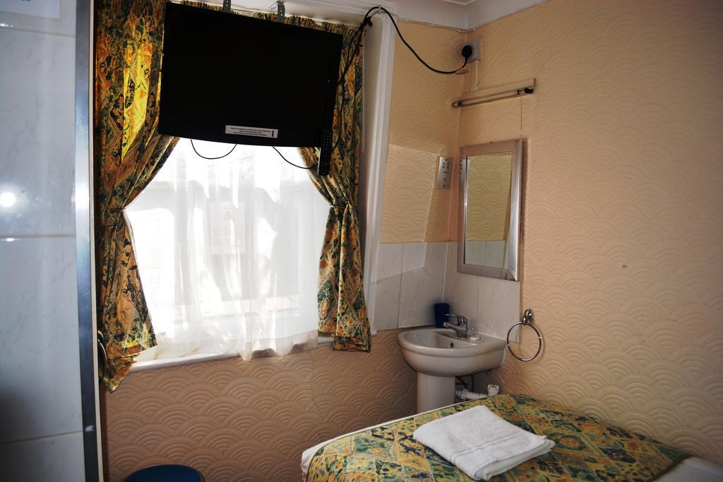 Falcon Hotel Londres Quarto foto