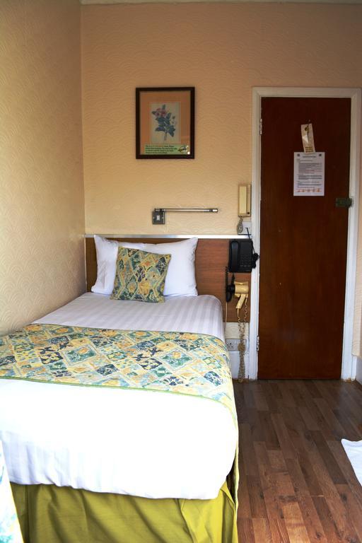 Falcon Hotel Londres Quarto foto