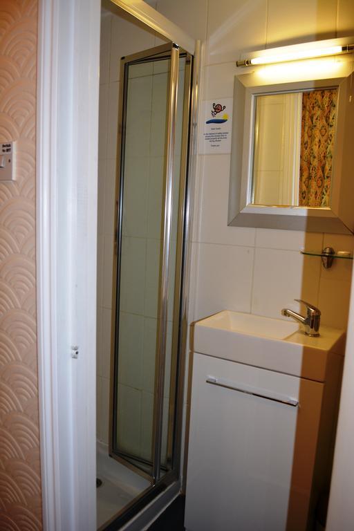 Falcon Hotel Londres Quarto foto
