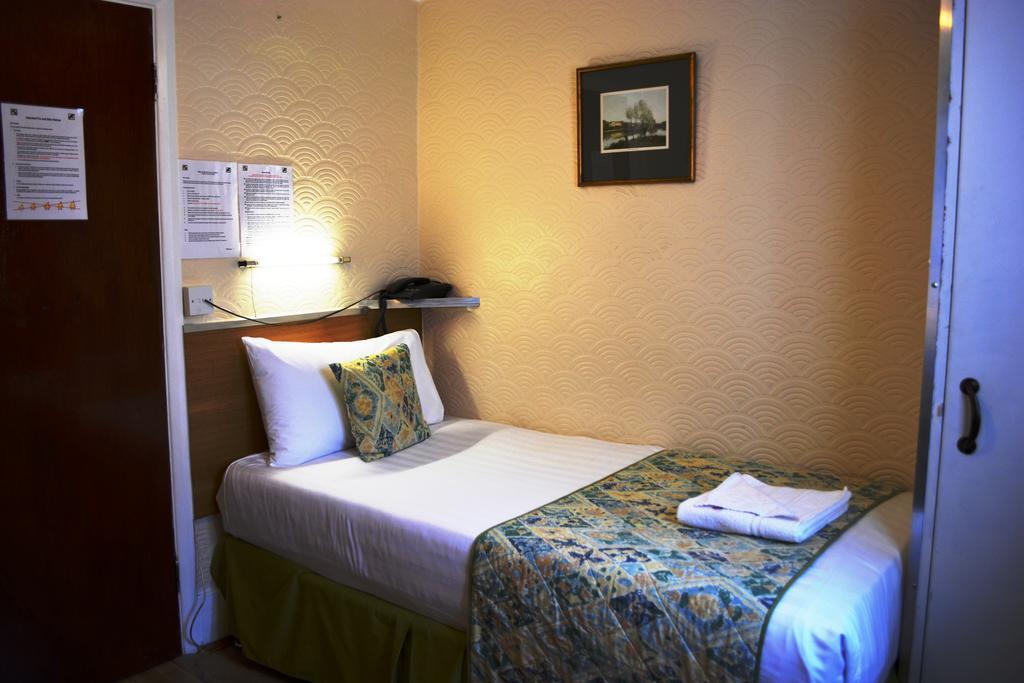Falcon Hotel Londres Quarto foto