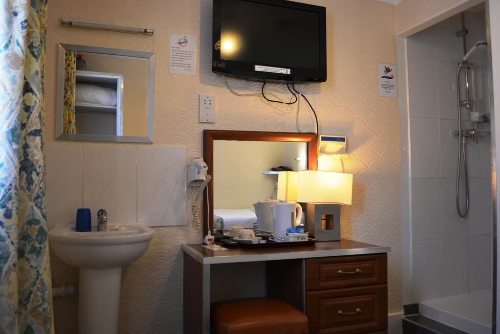 Falcon Hotel Londres Quarto foto