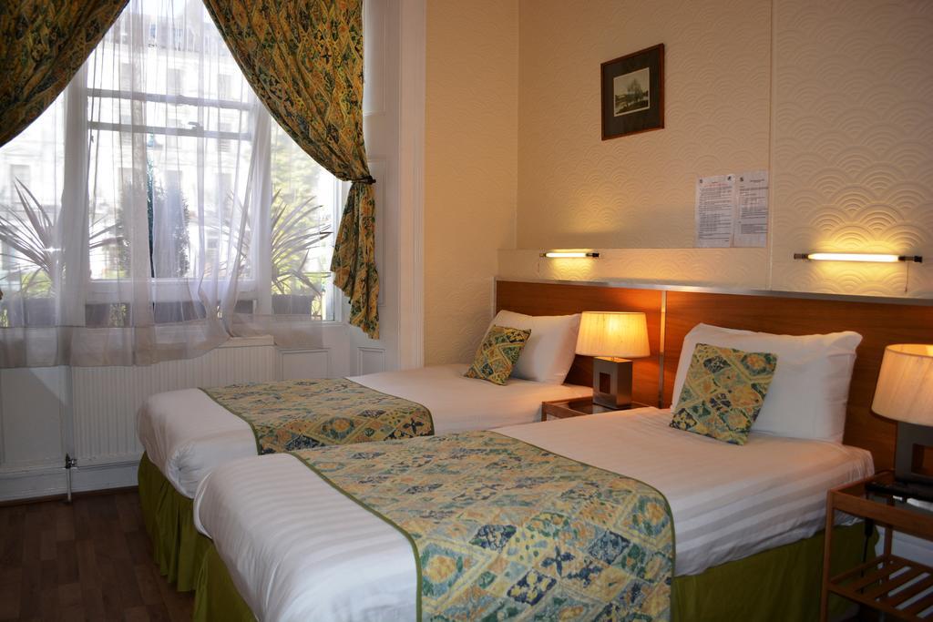 Falcon Hotel Londres Quarto foto