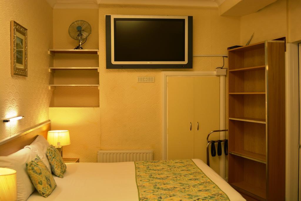 Falcon Hotel Londres Quarto foto
