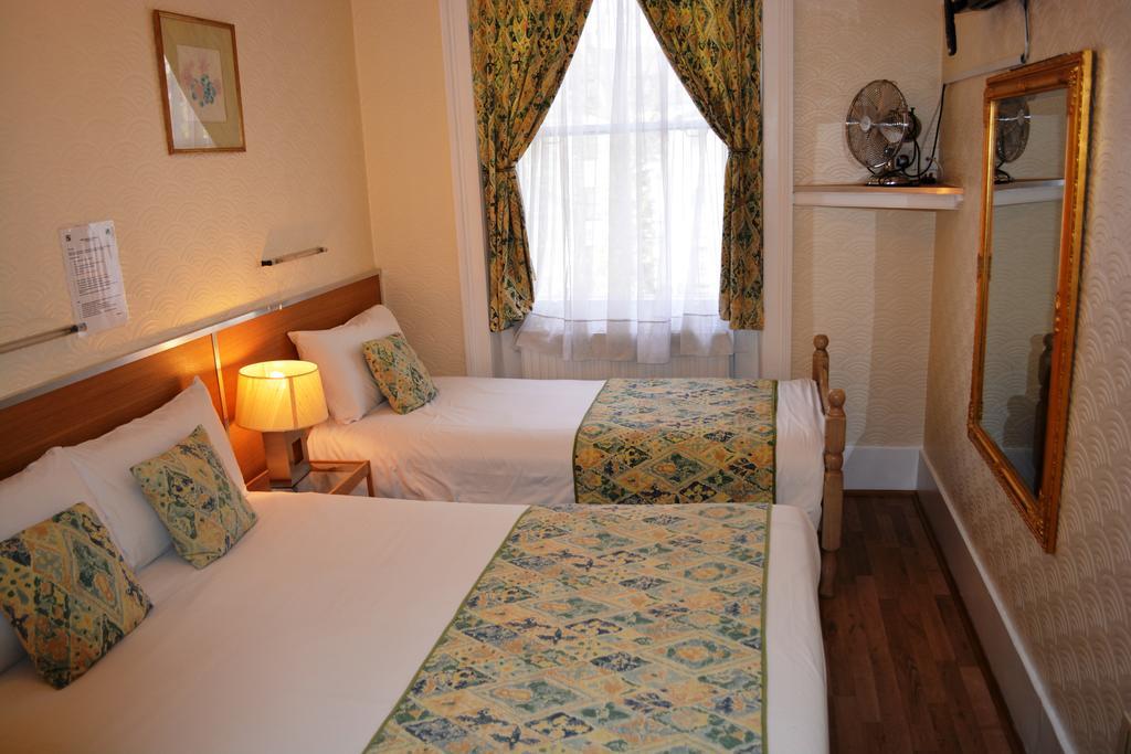 Falcon Hotel Londres Quarto foto
